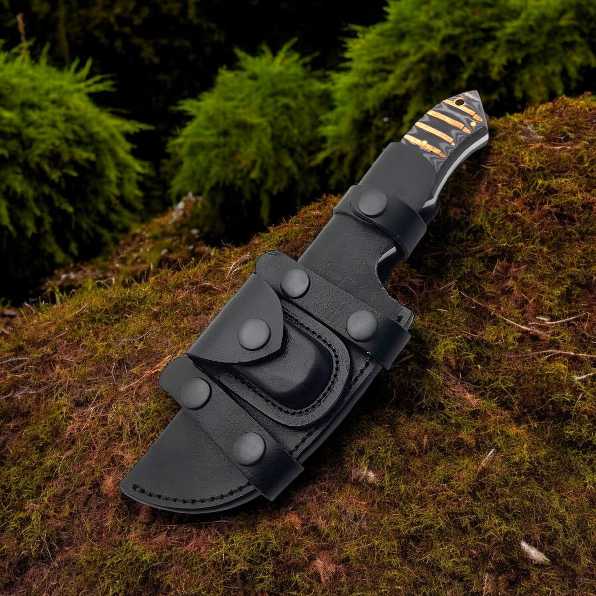 Outdoor survival knife in leather sheath with brass snaps

